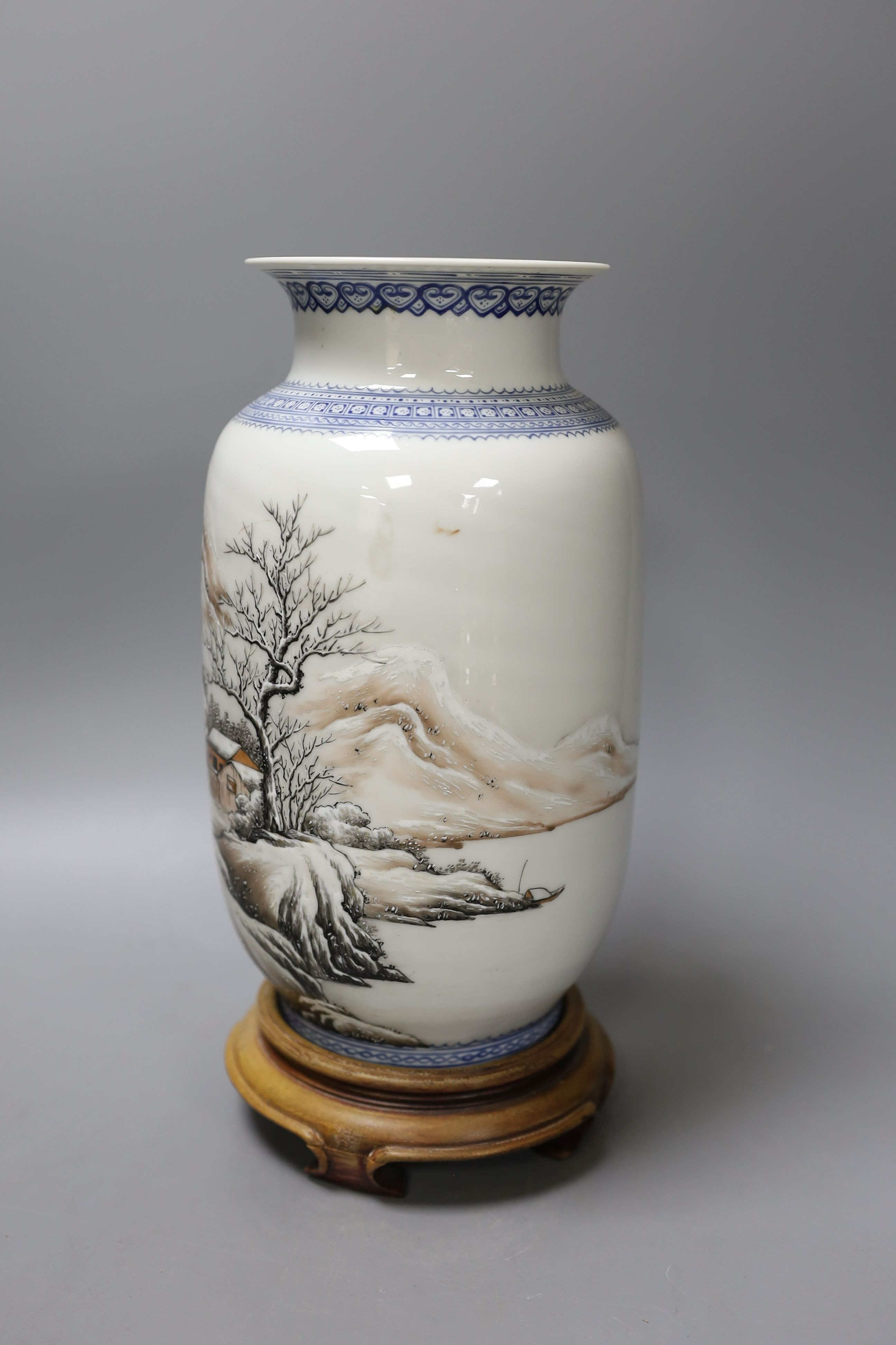 A mid 20th century Chinese enamelled porcelain winter landscape vase - 26cm tall including stand